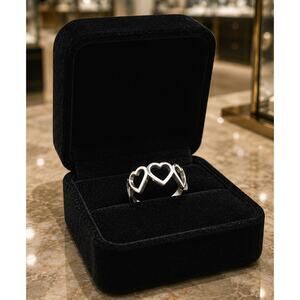 Vintage Inspired Alloy Hollow Heart Shaped Adjustable Ring Silvery